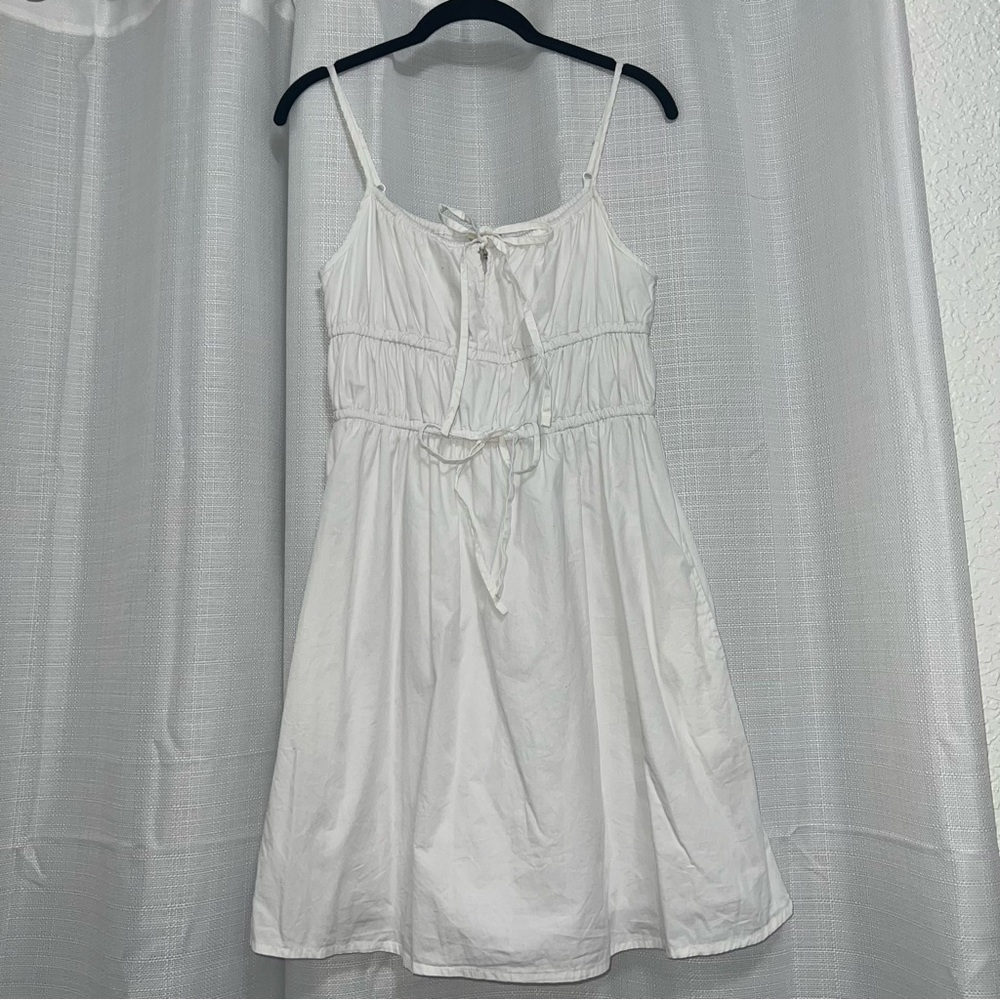 White Sleeveless Dress with Bow Detail